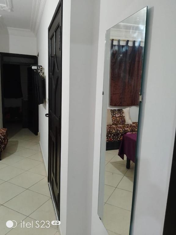 TV a/nebo společenská místnost v ubytování Un joli appartement à Martil pour vos vacances d'été proche de toutes les commodités et à 5 min de la plage !