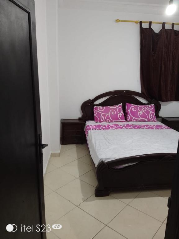 Postel nebo postele na pokoji v ubytování Un joli appartement à Martil pour vos vacances d'été proche de toutes les commodités et à 5 min de la plage !
