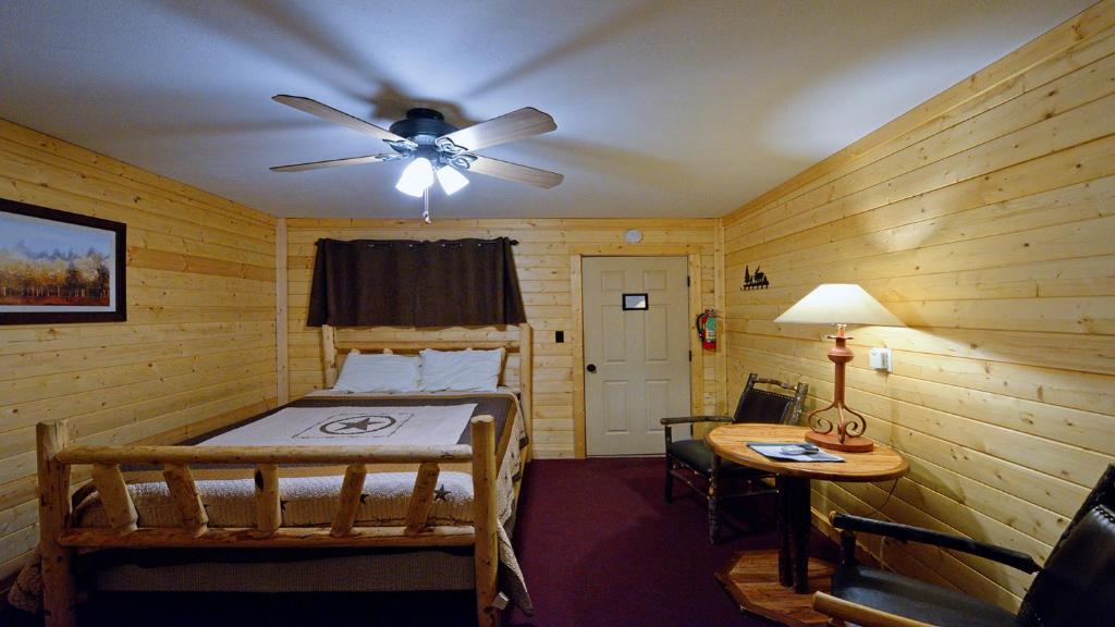 En eller flere senge i et værelse på Arrowhead 07 Deluxe