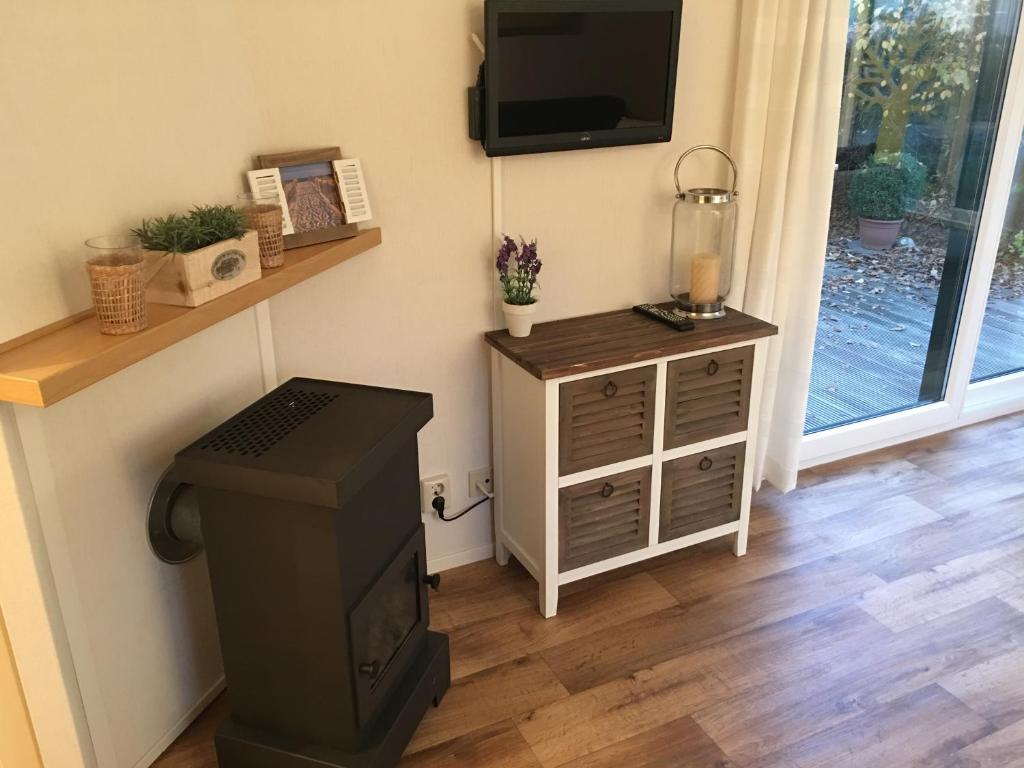 TV a/nebo společenská místnost v ubytování Sunnychalet