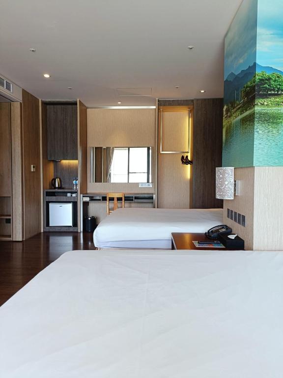Postel nebo postele na pokoji v ubytování Chii Lih Resort