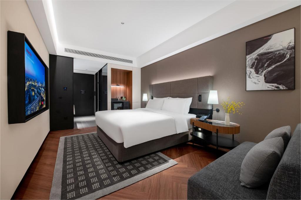 Postel nebo postele na pokoji v ubytování IntercityHotel Shenzhen Bay -Free laundry & Free MiniBar