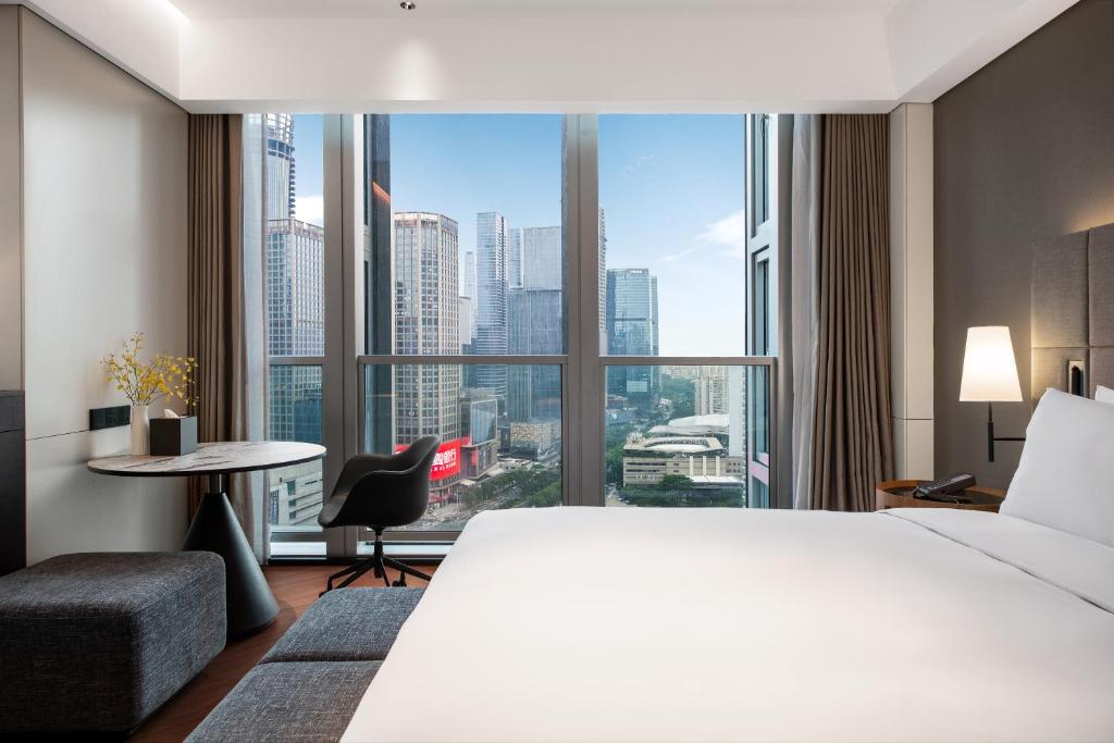 Postel nebo postele na pokoji v ubytování IntercityHotel Shenzhen Bay -Free laundry & Free MiniBar