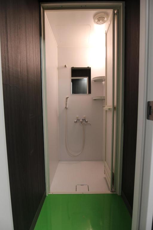 Koupelna v ubytování Dormitory Kinshu - ドミトリー錦繍