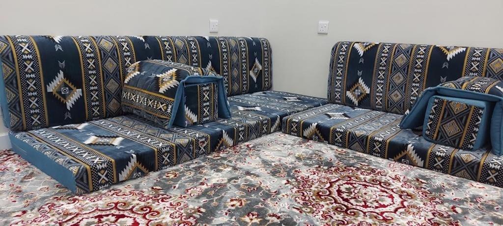 Postel nebo postele na pokoji v ubytování فيلا الكادي