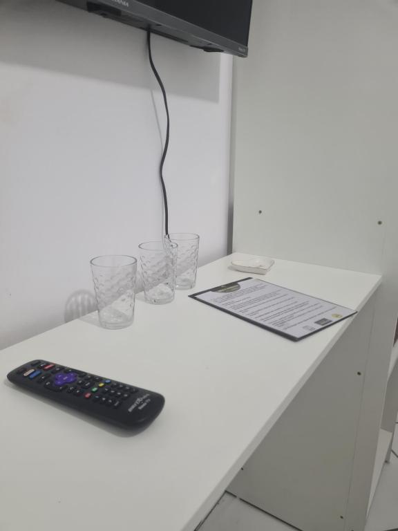 TV a/nebo společenská místnost v ubytování Hotel Aconchegante