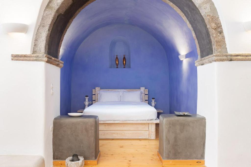 Postel nebo postele na pokoji v ubytování Cortile delle Stelle