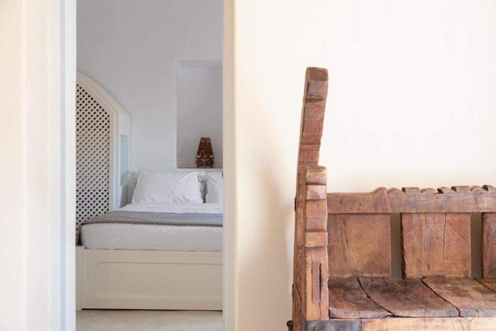 Postel nebo postele na pokoji v ubytování Cortile delle Stelle