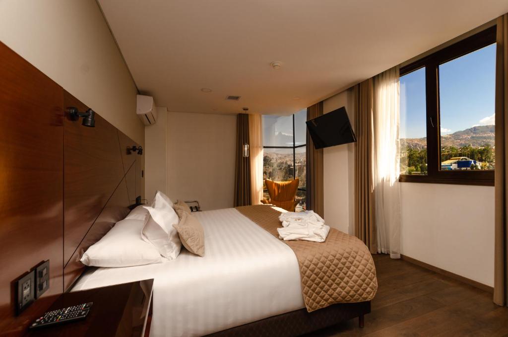 Postel nebo postele na pokoji v ubytování Hotel Mitru Sur