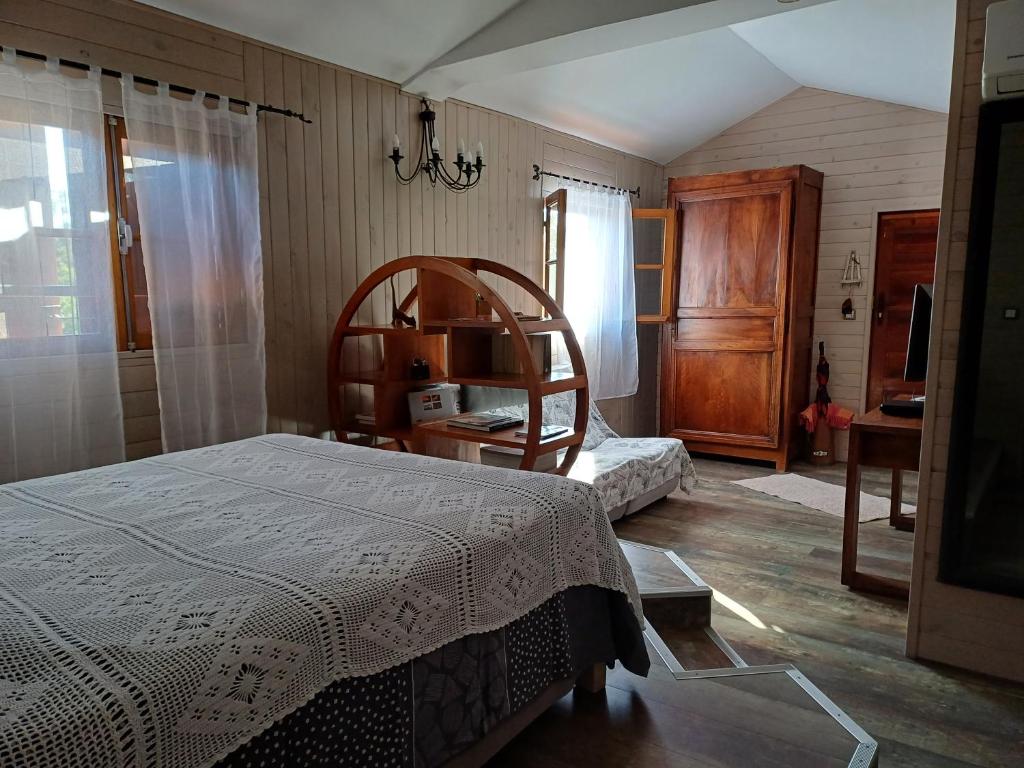 Postel nebo postele na pokoji v ubytování ti boukan trankil