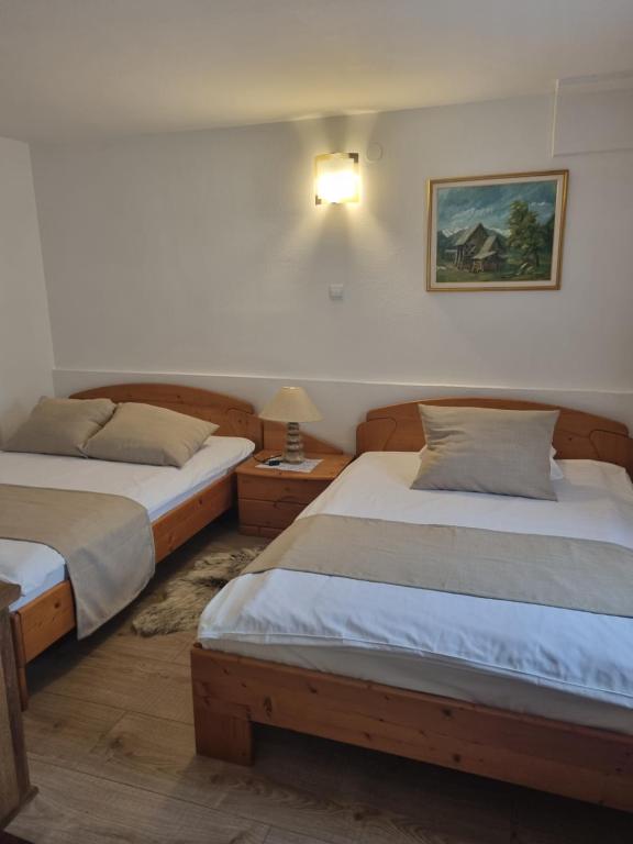 Postel nebo postele na pokoji v ubytování Art Hotel Kristal