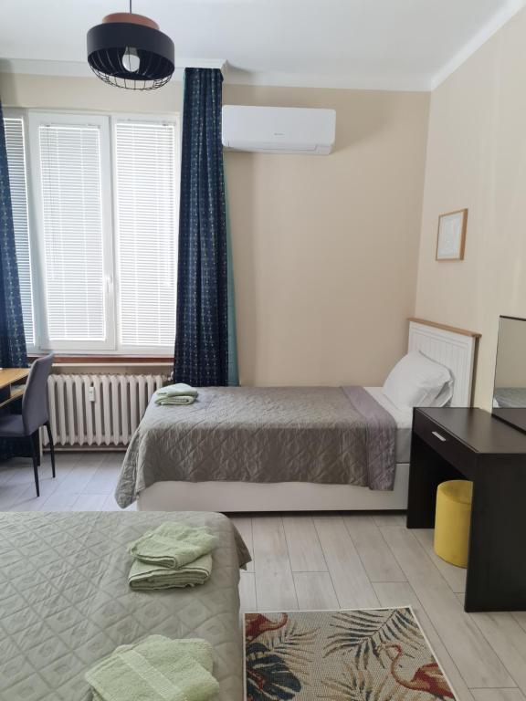 Postel nebo postele na pokoji v ubytování EL apartment
