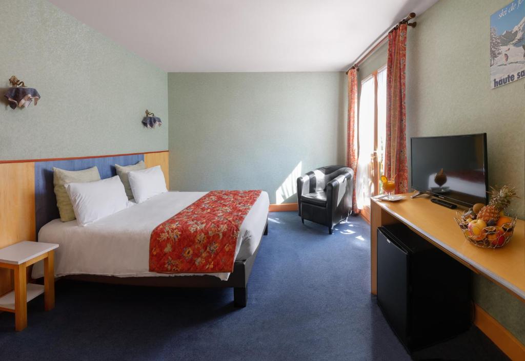 Postel nebo postele na pokoji v ubytování Brit Hotel Florimont