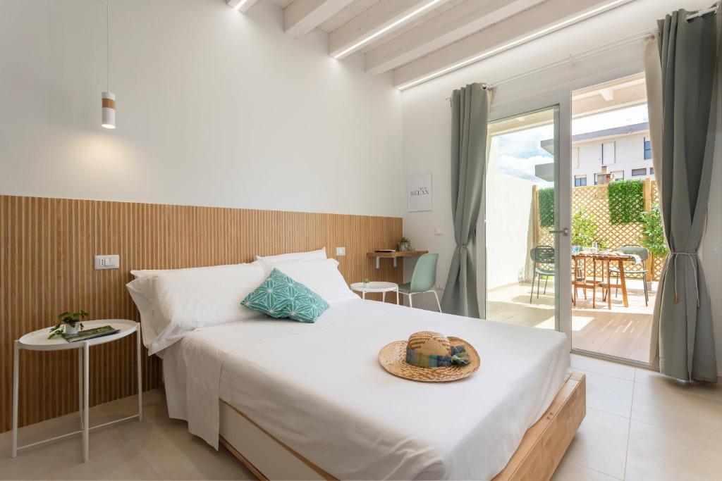Posteľ alebo postele v izbe v ubytovaní Domus Laetitiae Rooms & Apartments
