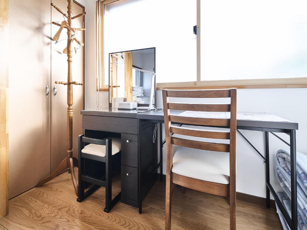 Kuchyň nebo kuchyňský kout v ubytování Okasan Hotel