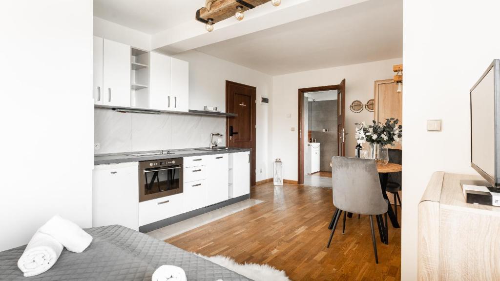 Kuchyňa alebo kuchynka v ubytovaní Aparthotel Delta Białka