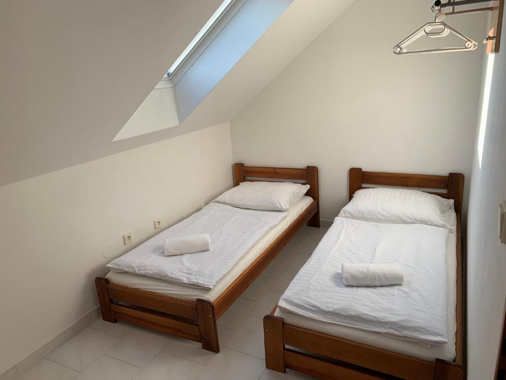 Postel nebo postele na pokoji v ubytování V srdci Moravy 2