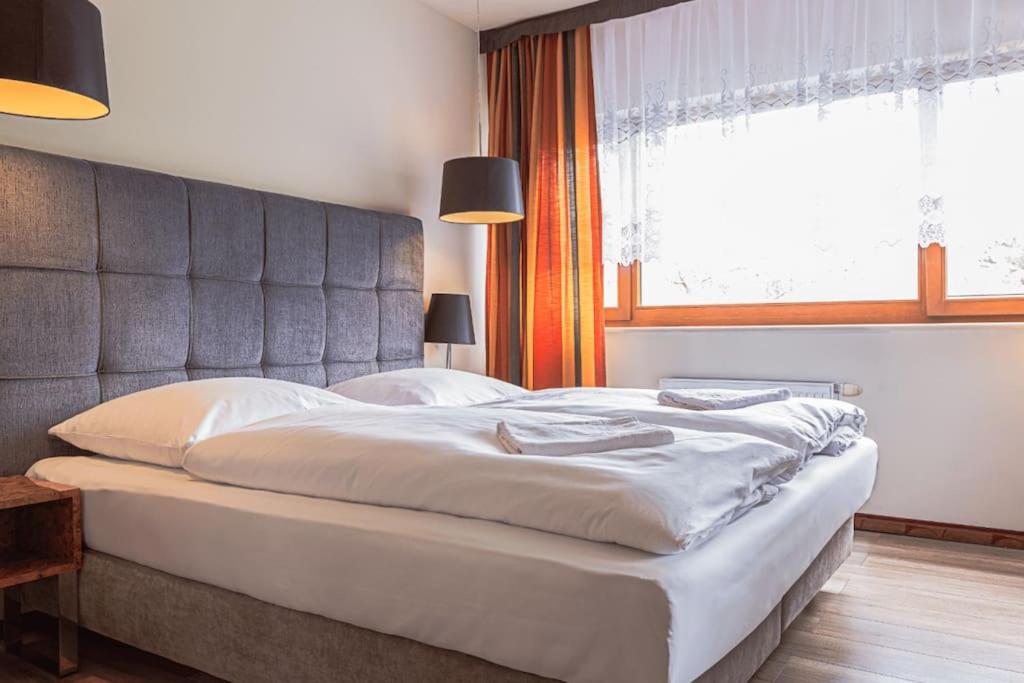 Posteľ alebo postele v izbe v ubytovaní VacationClub Royal Tulip Sand Apartament 309