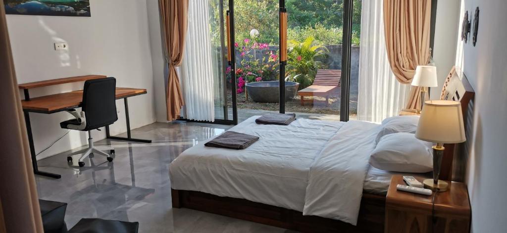 Ένα ή περισσότερα κρεβάτια σε δωμάτιο στο Villa Kiprey