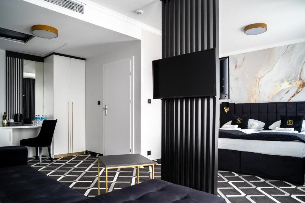 Posteľ alebo postele v izbe v ubytovaní Hotel Lantier Wellness & Spa
