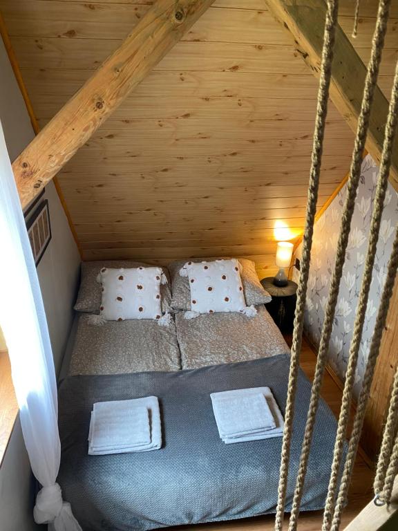 Postel nebo postele na pokoji v ubytování Stacja Zagajnik