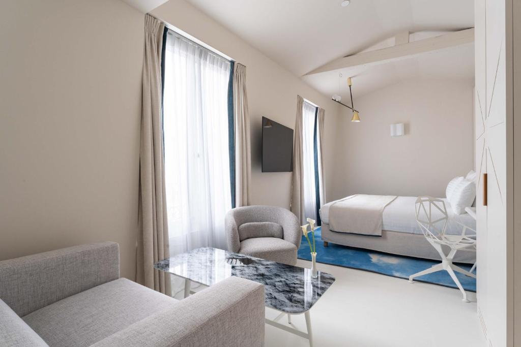 Postel nebo postele na pokoji v ubytování Hotel Astra Opera - Astotel