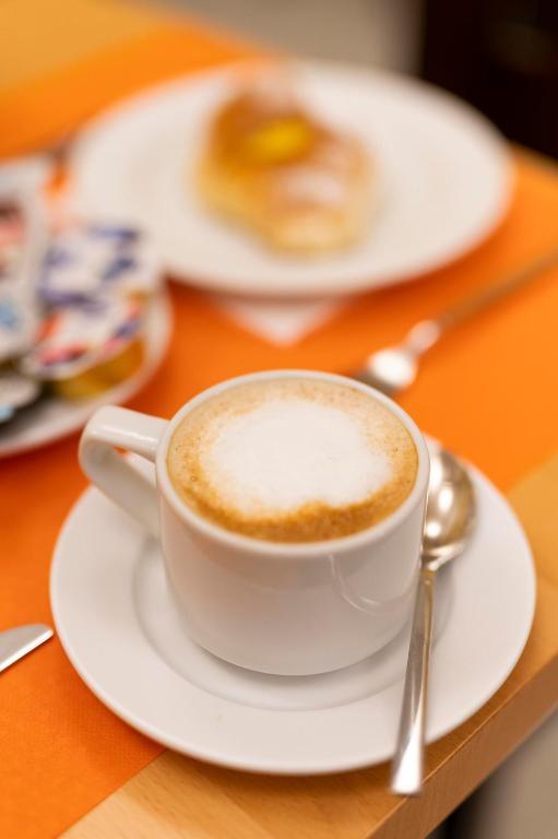 Opções de café da manhã disponíveis para hóspedes em Hotel Virgilio