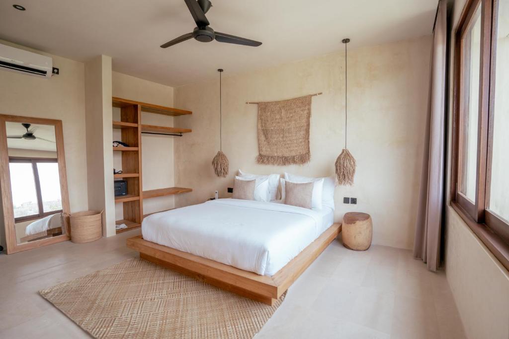 Postel nebo postele na pokoji v ubytování Olea Villas Resort