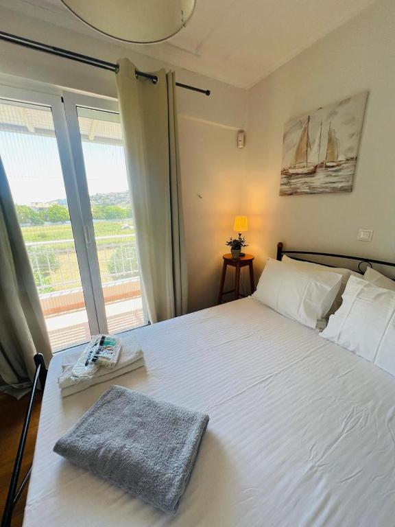 Posteľ alebo postele v izbe v ubytovaní Lefkada Beach Villa