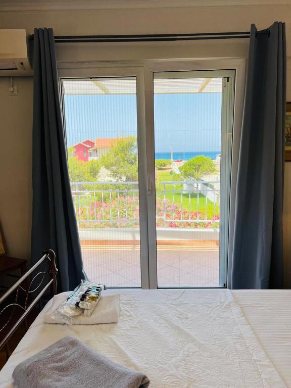 Posteľ alebo postele v izbe v ubytovaní Lefkada Beach Villa