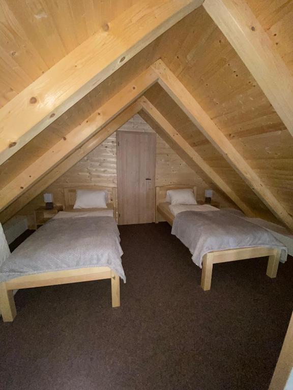 Postel nebo postele na pokoji v ubytování Chalupa Štěpán