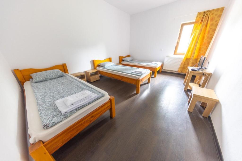 Postel nebo postele na pokoji v ubytování Hostel Gurasada