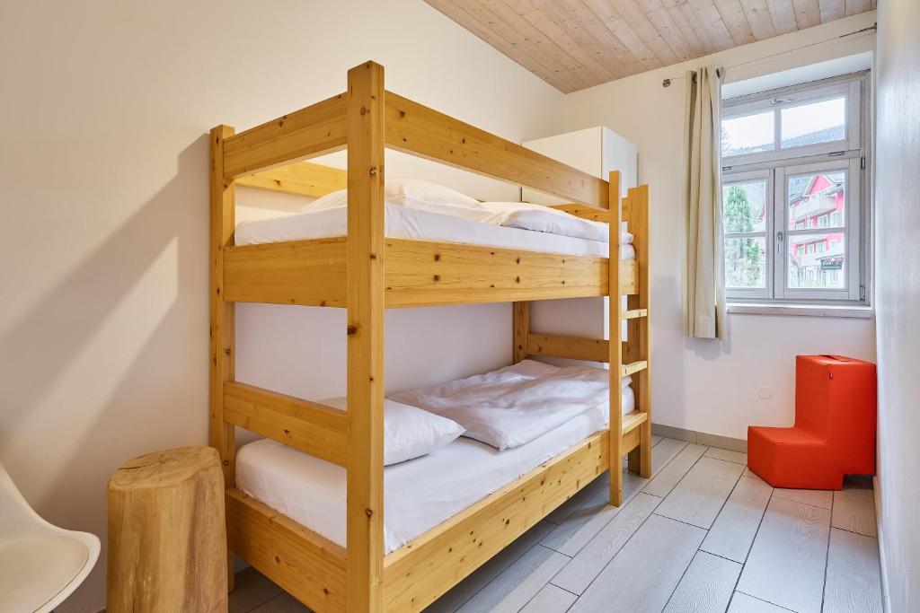 Postel nebo postele na pokoji v ubytování Snezka Residence