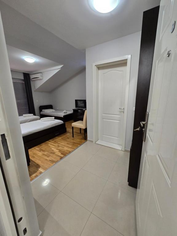 Postel nebo postele na pokoji v ubytování Apartments Philip II