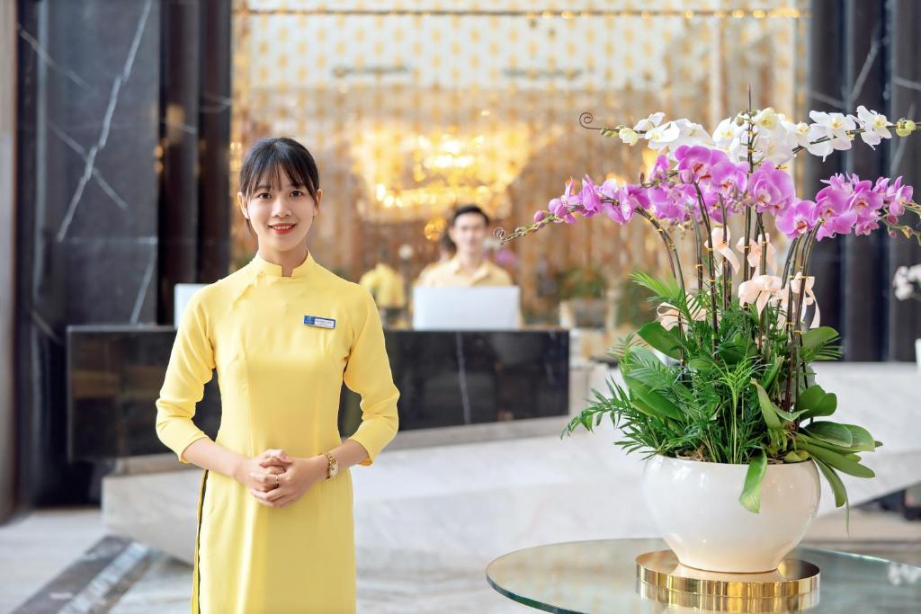 Členové personálu v ubytování Le Pavillon Hoi An Gallery Hotel & Spa