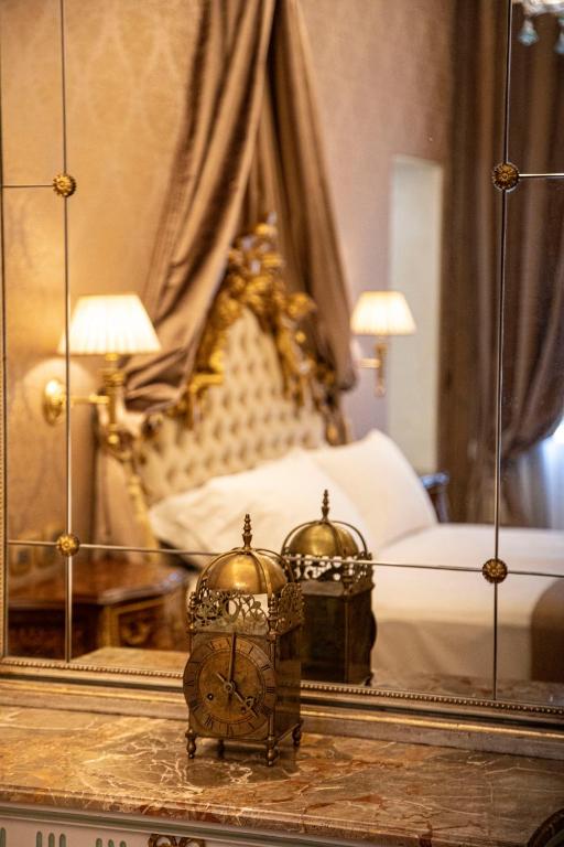 Postel nebo postele na pokoji v ubytování Palazzo dei Mori
