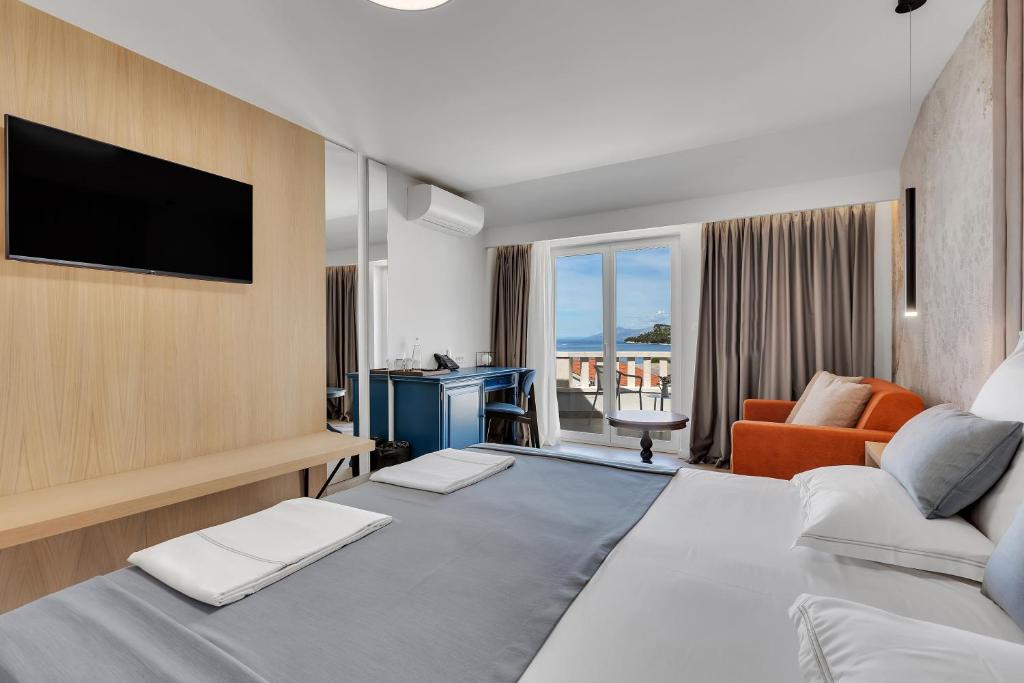 Postel nebo postele na pokoji v ubytování Hotel Laurentum