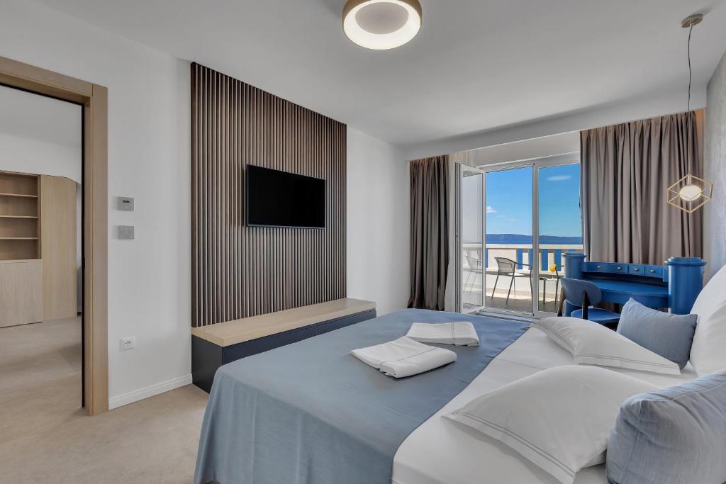 Postel nebo postele na pokoji v ubytování Hotel Laurentum
