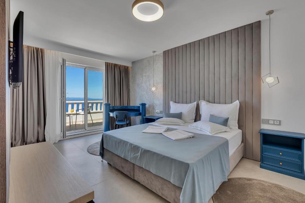 Postel nebo postele na pokoji v ubytování Hotel Laurentum