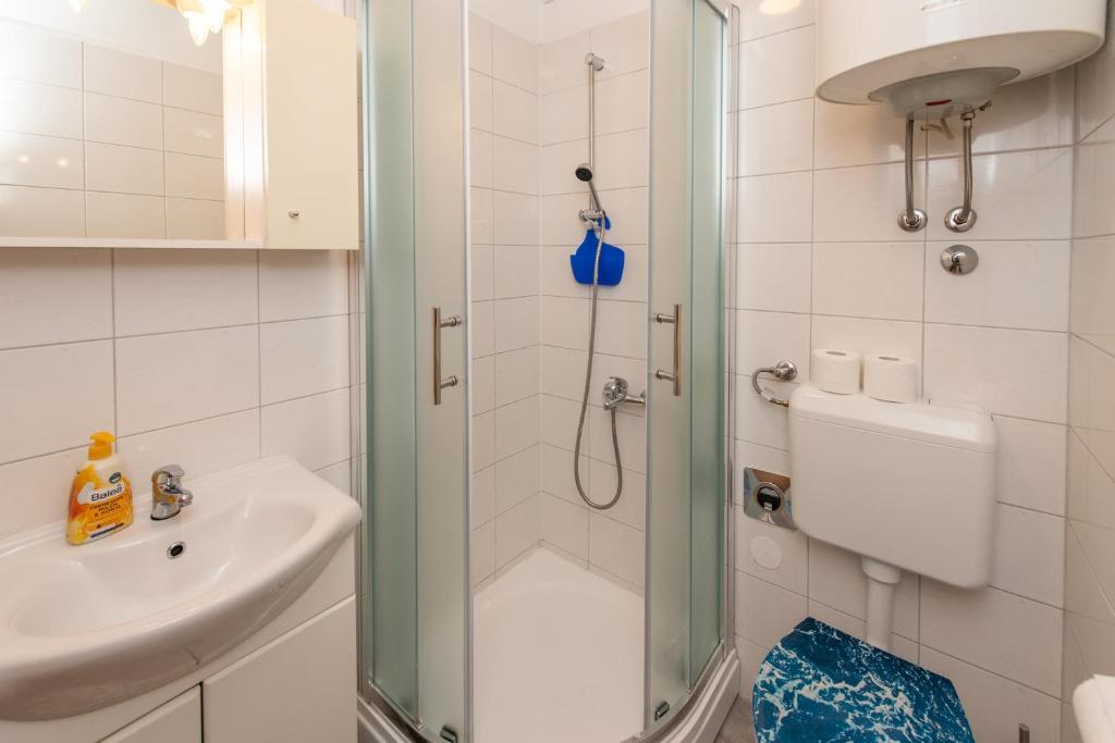 Kúpeľňa v ubytovaní Laghanini Apartments