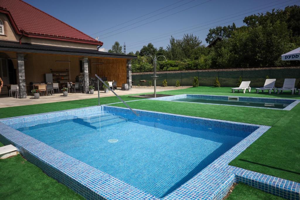 Bazén v ubytování Aqua Hotel nebo v jeho okolí