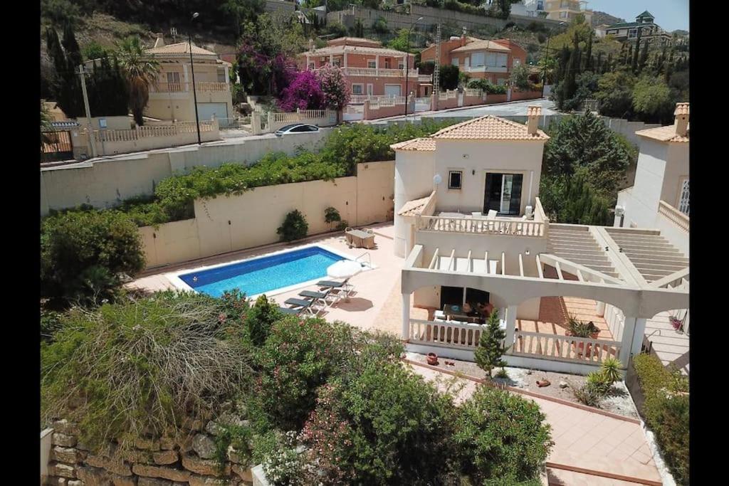 an aerial view of a house with a swimming pool at Casa Verano in Alicante