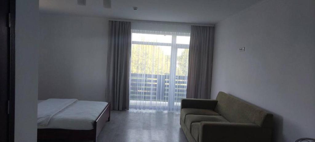 Postel nebo postele na pokoji v ubytování Spa Hotel Alpin