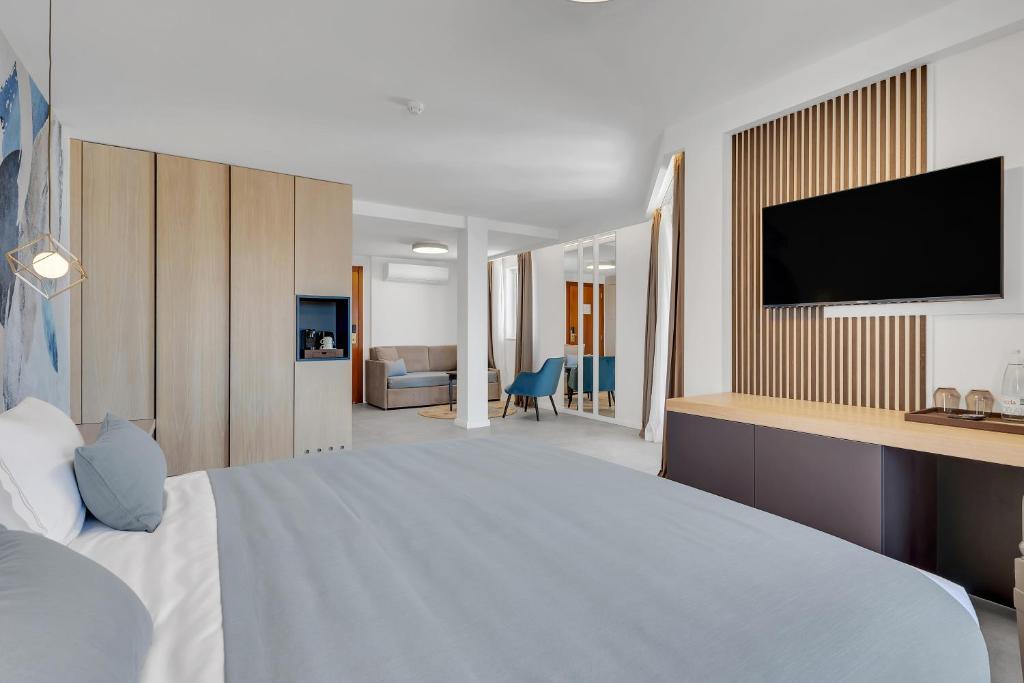 TV a/nebo společenská místnost v ubytování Hotel Laurentum