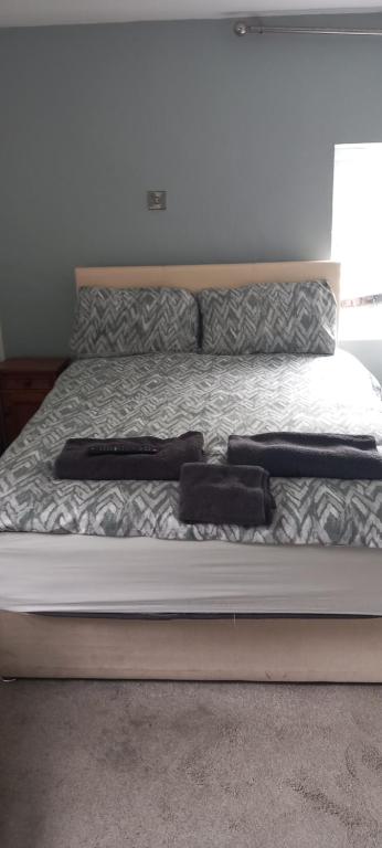 Voodi või voodid majutusasutuse Maid Of Erin Guesthouse toas