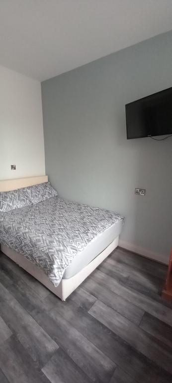 Voodi või voodid majutusasutuse Maid Of Erin Guesthouse toas