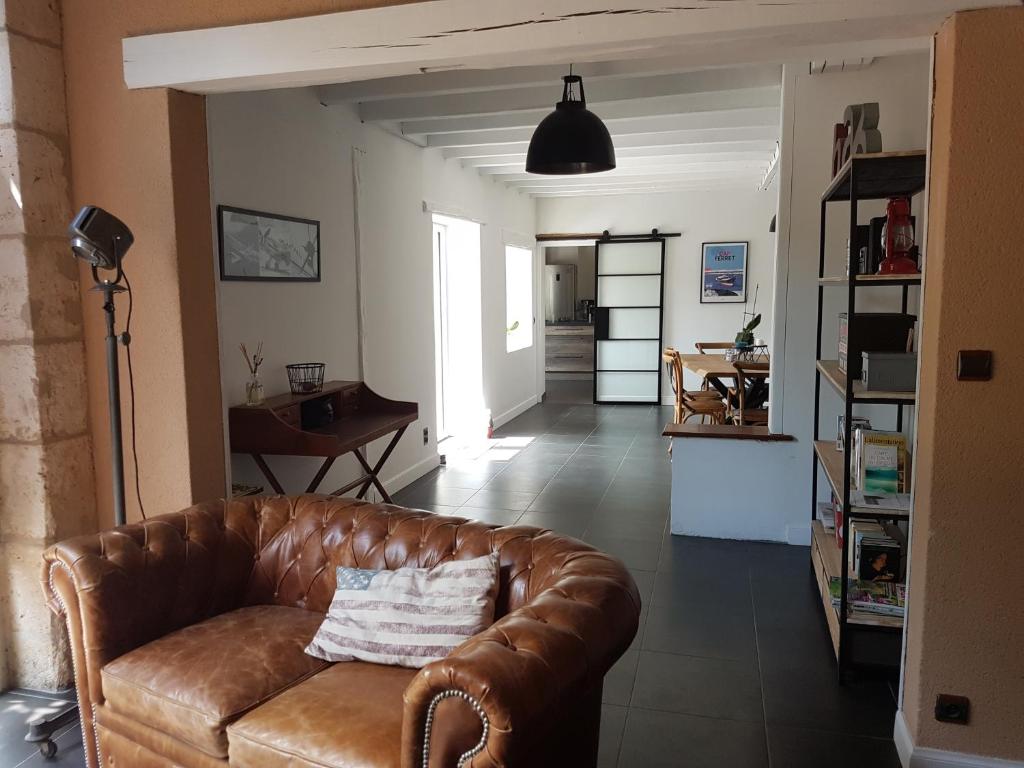 Posezení v ubytování Maison longère La Grange