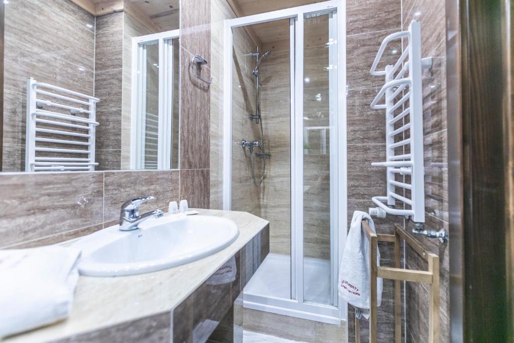 Kúpeľňa v ubytovaní Apartamenty z widokiem na Tatry Cztery Pory Roku