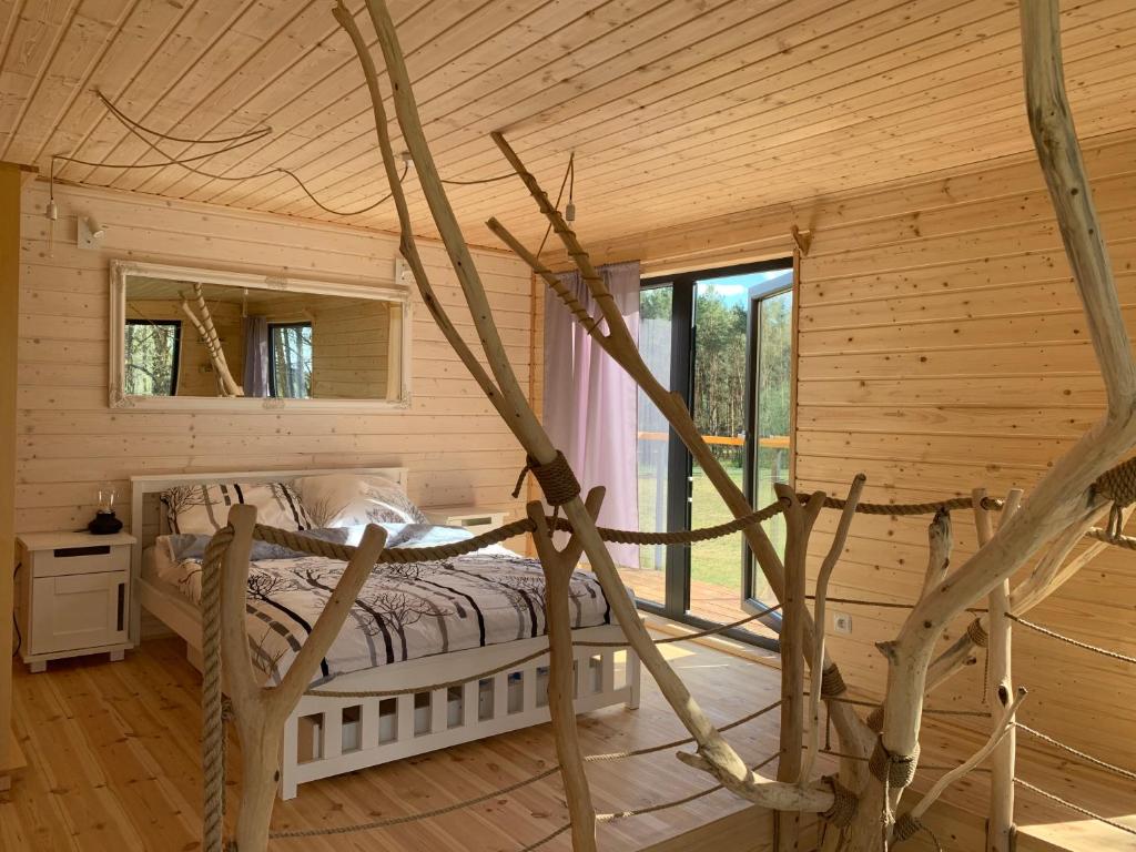 Posedenie v ubytovaní Domek na drzewie w Dolinie Uradu