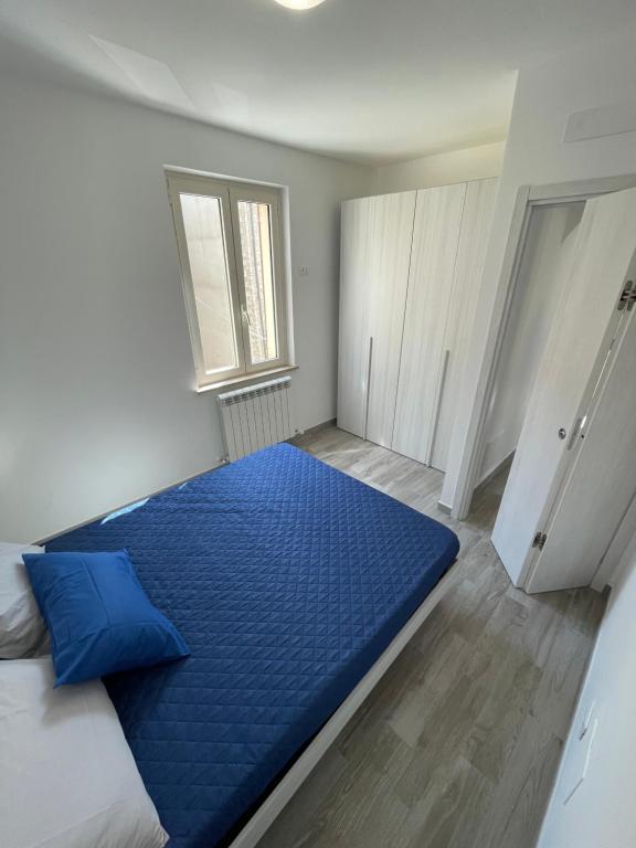 Postel nebo postele na pokoji v ubytování Locanda Francescana